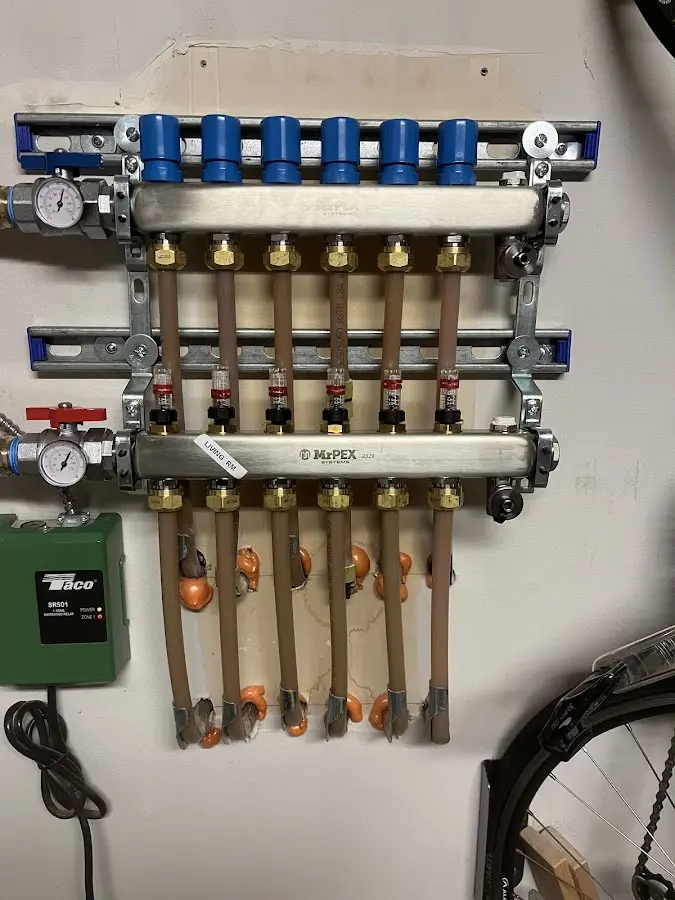 Plumber performing Water Heater Repair at a residential property in Windsor